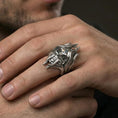 Load image into Gallery viewer, Polished sterling silver lich skull ring on a human finger, detailed skull ring, D&D fantasy jewelry
