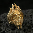 Load image into Gallery viewer, Gold plated lich skull ring on black volcanic stone, dark fantasy wizard skull motif, bold statement jewelry
