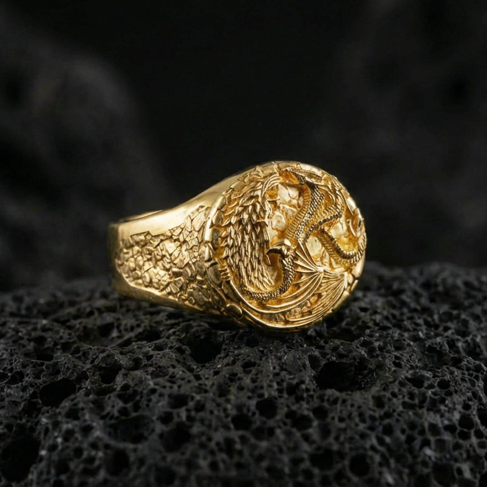 Gold plated wolf and dragon ring on black volcanic stone, fantasy symbolism jewelry, sculpted creature relief