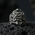 Load image into Gallery viewer, Oxidized sterling silver Medusa head ring on black volcanic stone, snake hair gorgon face relief, Greek mythology signet ring
