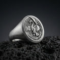 Load image into Gallery viewer, Oxidized sterling silver dragon signet ring on black volcanic stone, medieval winged dragon relief, fantasy statement ring
