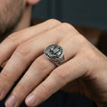 Load image into Gallery viewer, Oxidized sterling silver Flying Dutchman ship signet ring worn on a human finger, nautical sailing ship relief, pirate style ring
