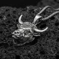 Load image into Gallery viewer, Oxidized sterling silver bull head necklace pendant on black volcanic stone, Taurus zodiac horned buffalo charm, braided chain
