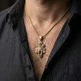 Load image into Gallery viewer, Gold plated Assyrian lamassu pendant worn on a human neck, ancient civilization guardian necklace, braided chain
