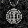 Load image into Gallery viewer, Oxidized sterling silver St. Benedict medallion necklace on black volcanic stone, Catholic protection pendant, braided chain
