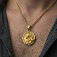 Load image into Gallery viewer, Gold plated Viking warrior pendant necklace worn on neck, premium lifestyle composition, Norse helmet profile centerpiece design
