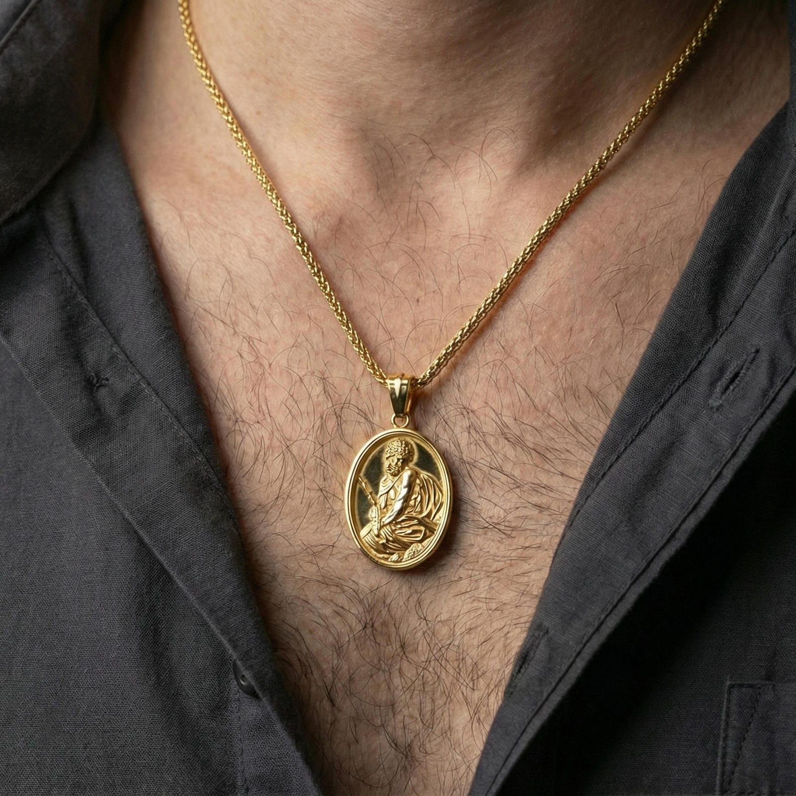 Gold plated Jesus Christ pendant necklace worn on neck, premium lifestyle composition, devotional oval medallion centerpiece