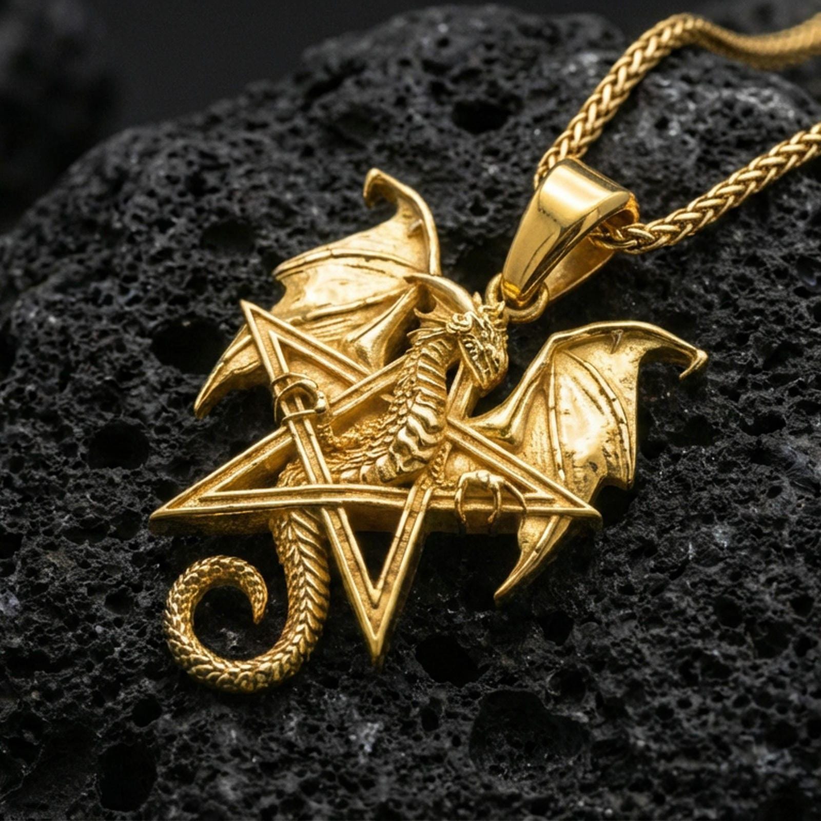 Gold plated pentagram dragon pendant on porous volcanic rock backdrop, gothic wiccan star design with sculpted dragon body, high-contrast lighting
