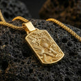 Load image into Gallery viewer, Gold plated dragon and phoenix pendant on dark volcanic rock, yin yang balance charm necklace, sharp macro shot
