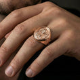 Load image into Gallery viewer, Rose gold plated Our Lady of Guadalupe oval signet ring worn on finger, Marian devotional statement ring, elegant lifestyle photo
