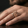 Load image into Gallery viewer, Rose gold plated Jesus Christ ring worn on finger, Christ face relief ring, Christian religious jewelry lifestyle photo
