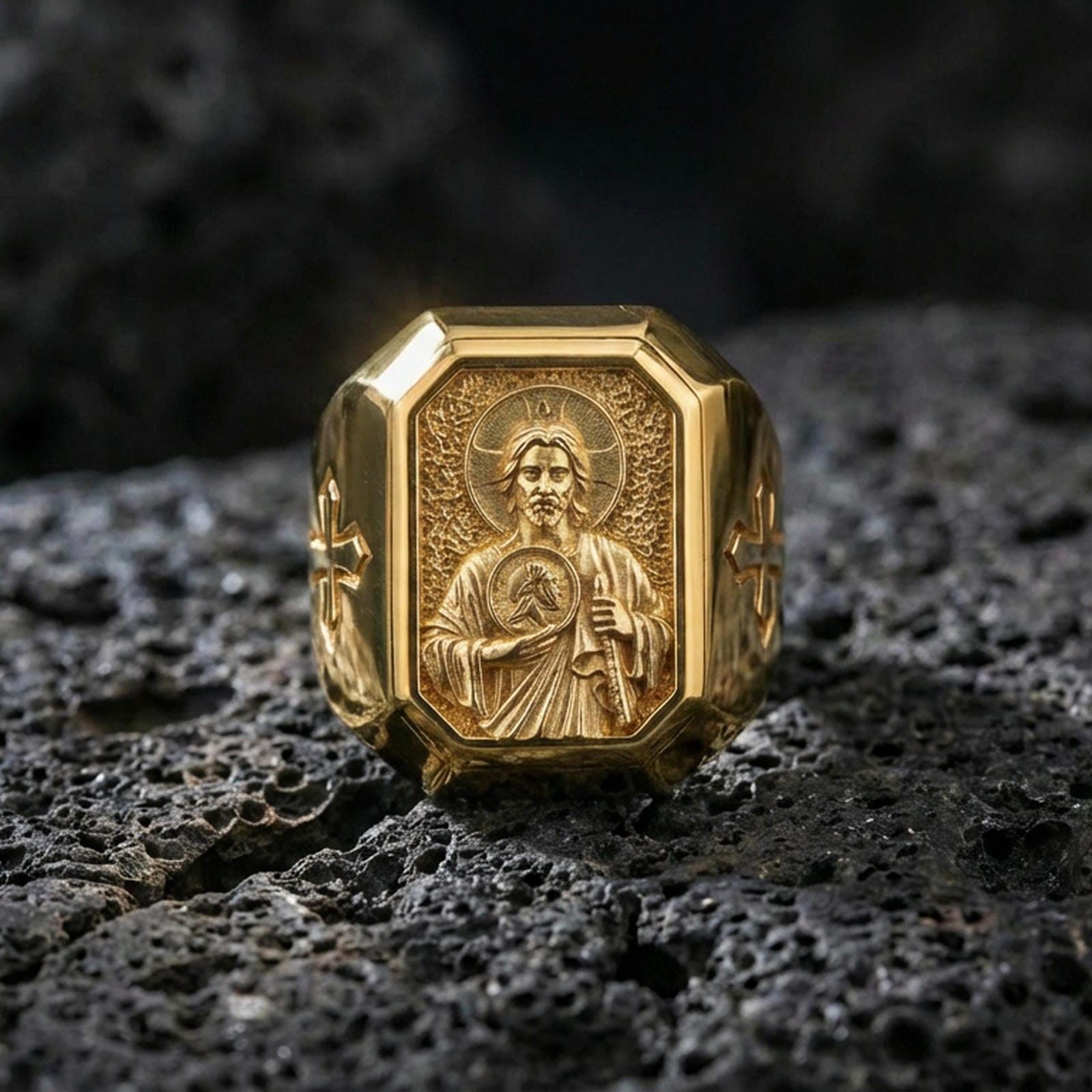 Gold plated St Jude signet ring on dark volcanic rock, saint portrait relief, cross side detail