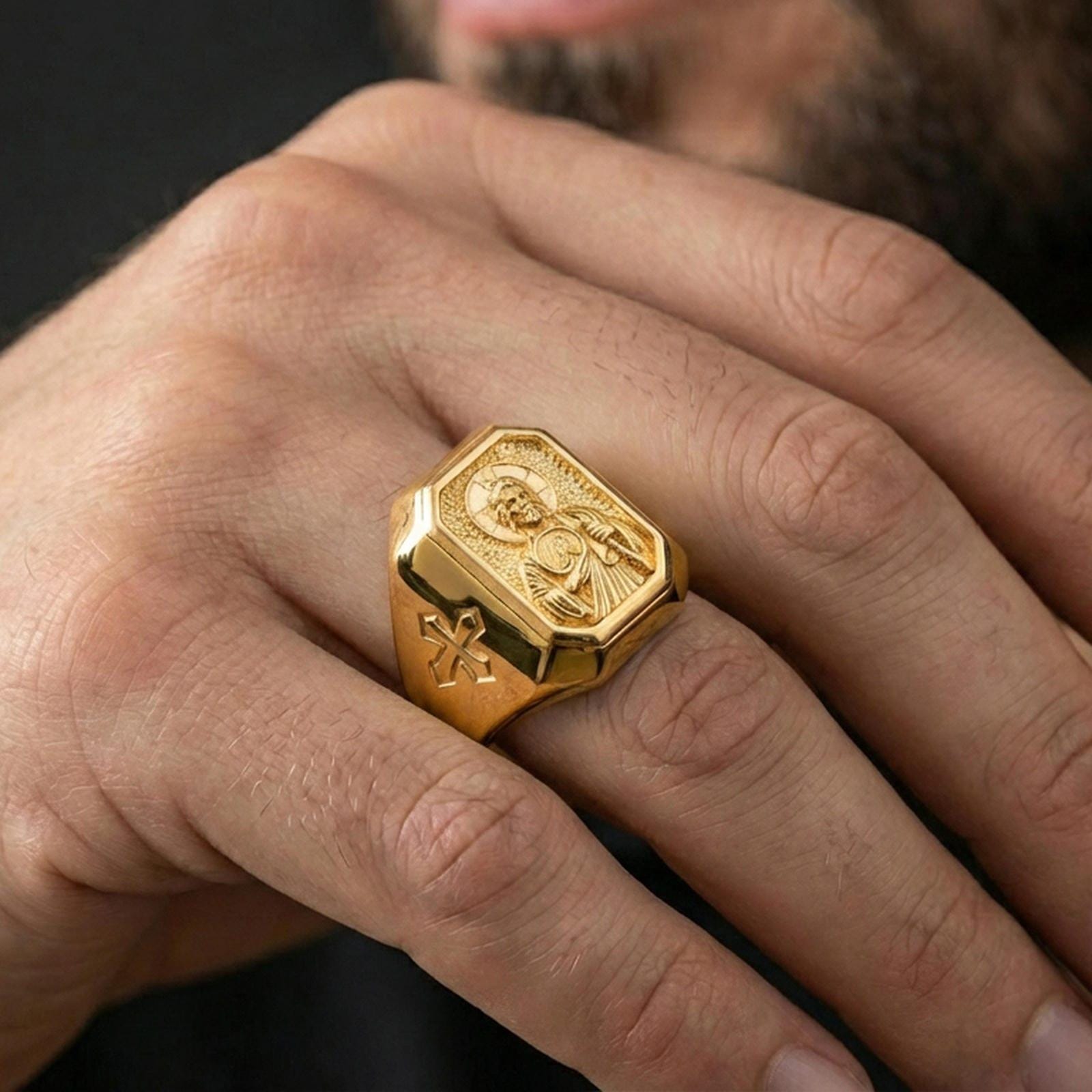 Gold plated St Jude ring worn on finger, cross side view, saint relief signet ring for men