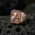 Load image into Gallery viewer, Rose gold plated Saint Benedict ring on volcanic stone, religious signet style, saint icon relief
