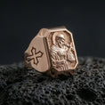 Load image into Gallery viewer, Rose gold plated Saint Francis ring on volcanic stone, religious signet style, saint icon carving

