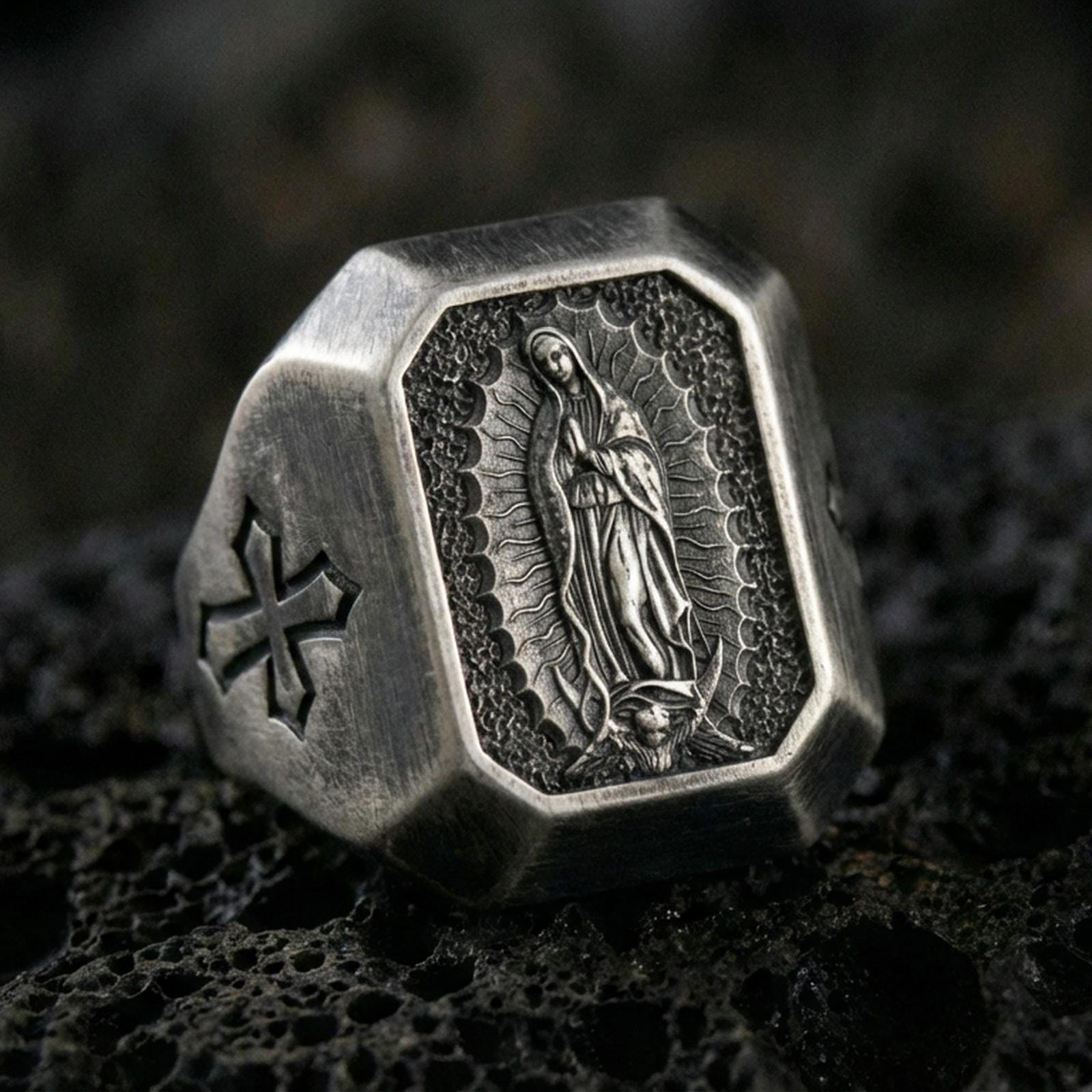 Oxidized sterling silver Our Lady of Guadalupe signet ring on volcanic rock, Marian icon relief, cross shoulder detail