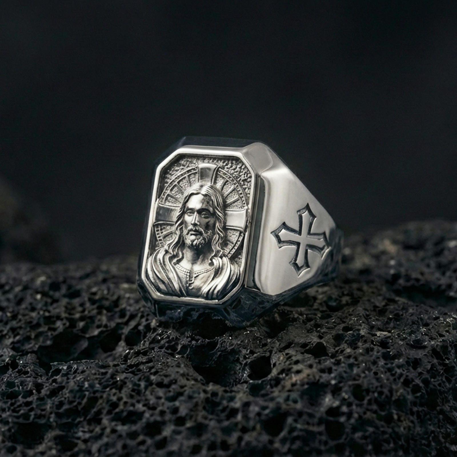 Polished silver Jesus Christ ring on porous volcanic stone, detailed Christ face engraving, Christian signet jewelry