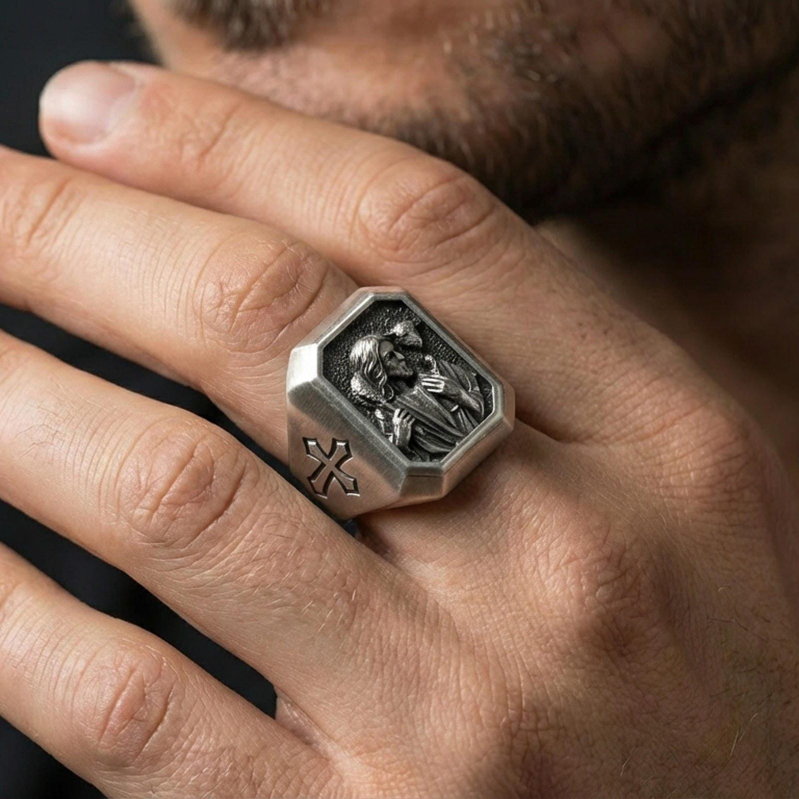 Oxidized sterling silver Jesus Shepherd ring worn on finger, Good Shepherd relief with lamb, cross shoulder engraving