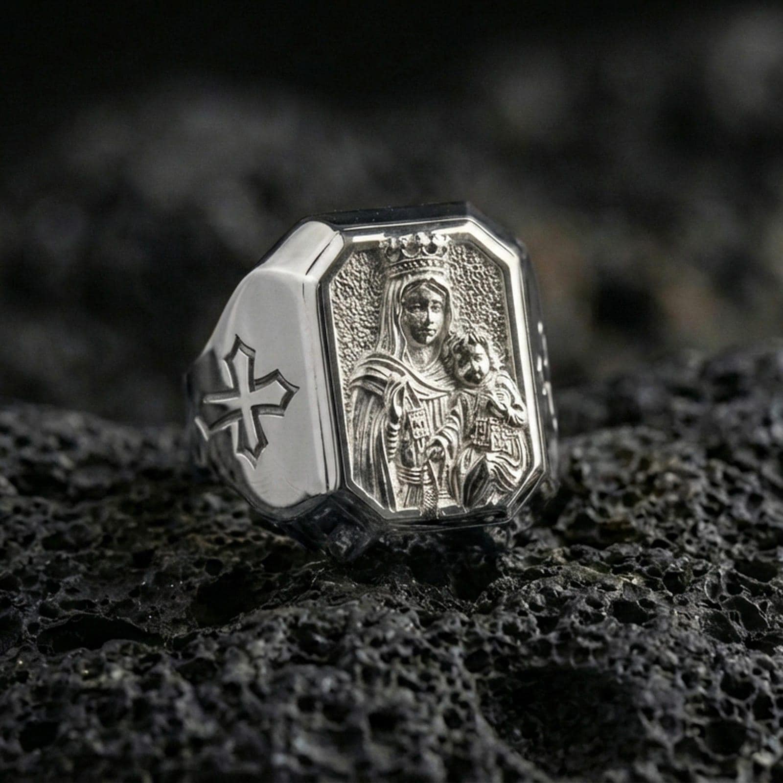 Polished silver Madonna and Child signet ring on porous volcanic stone, detailed Virgin Mary portrait, Catholic devotion jewelry