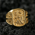 Load image into Gallery viewer, Gold plated Saint Christopher traveler ring on dark volcanic rock, carrying child relief engraving, Christian protection jewelry
