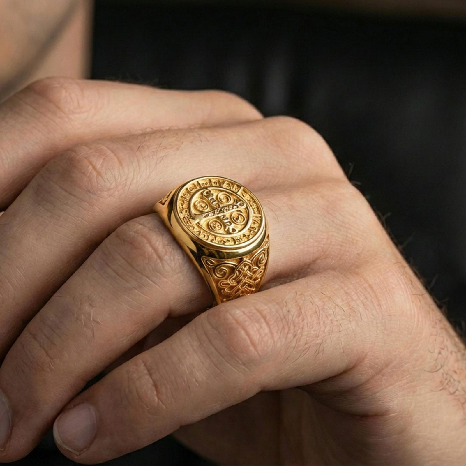 Gold plated St Benedict signet ring worn on finger, Catholic spiritual protection symbol, meaningful faith gift for him