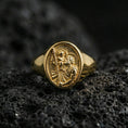 Load image into Gallery viewer, Gold plated St Christopher signet ring on dark volcanic rock, patron of travelers icon relief, faith protection ring gift
