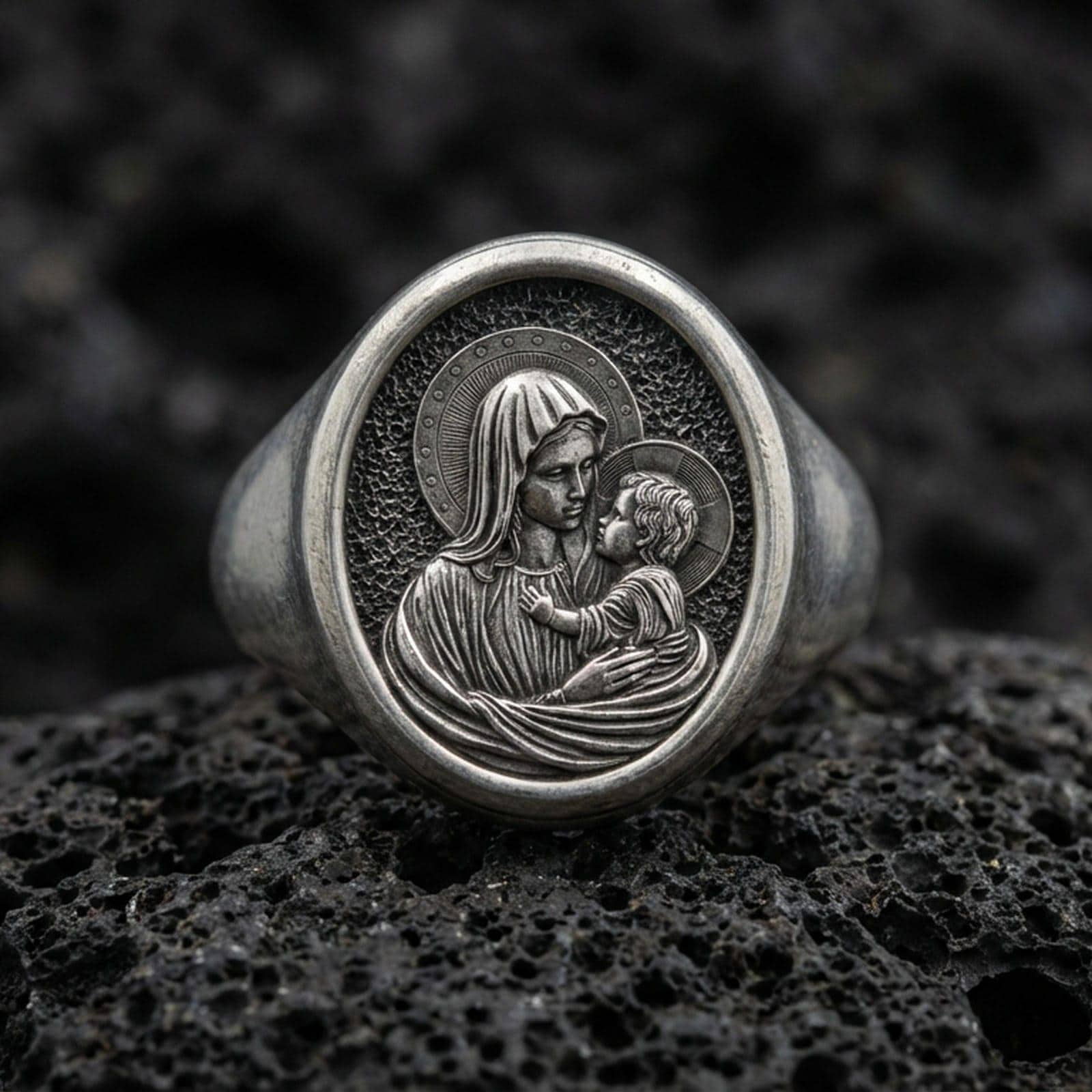 Oxidized sterling silver Mother Mary ring on volcanic rock, Madonna and Child relief, Catholic devotional jewelry