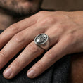 Load image into Gallery viewer, Oxidized sterling silver Sacred Heart ring worn on finger, thorned heart and cross engraving, Catholic protection jewelry
