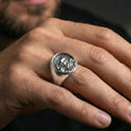 Load image into Gallery viewer, Polished silver Padre Pio signet ring worn on finger, detailed saint profile relief, faith-inspired jewelry
