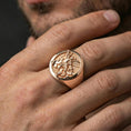Load image into Gallery viewer, Rose gold plated St. Michael signet ring worn on finger, archangel relief design, elegant faith jewelry
