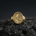 Load image into Gallery viewer, Gold plated Pope John Paul II signet ring on dark volcanic rock, Catholic religious portrait design, faith jewelry
