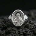 Load image into Gallery viewer, Polished silver Saint Jude ring on volcanic stone, detailed devotional signet closeup
