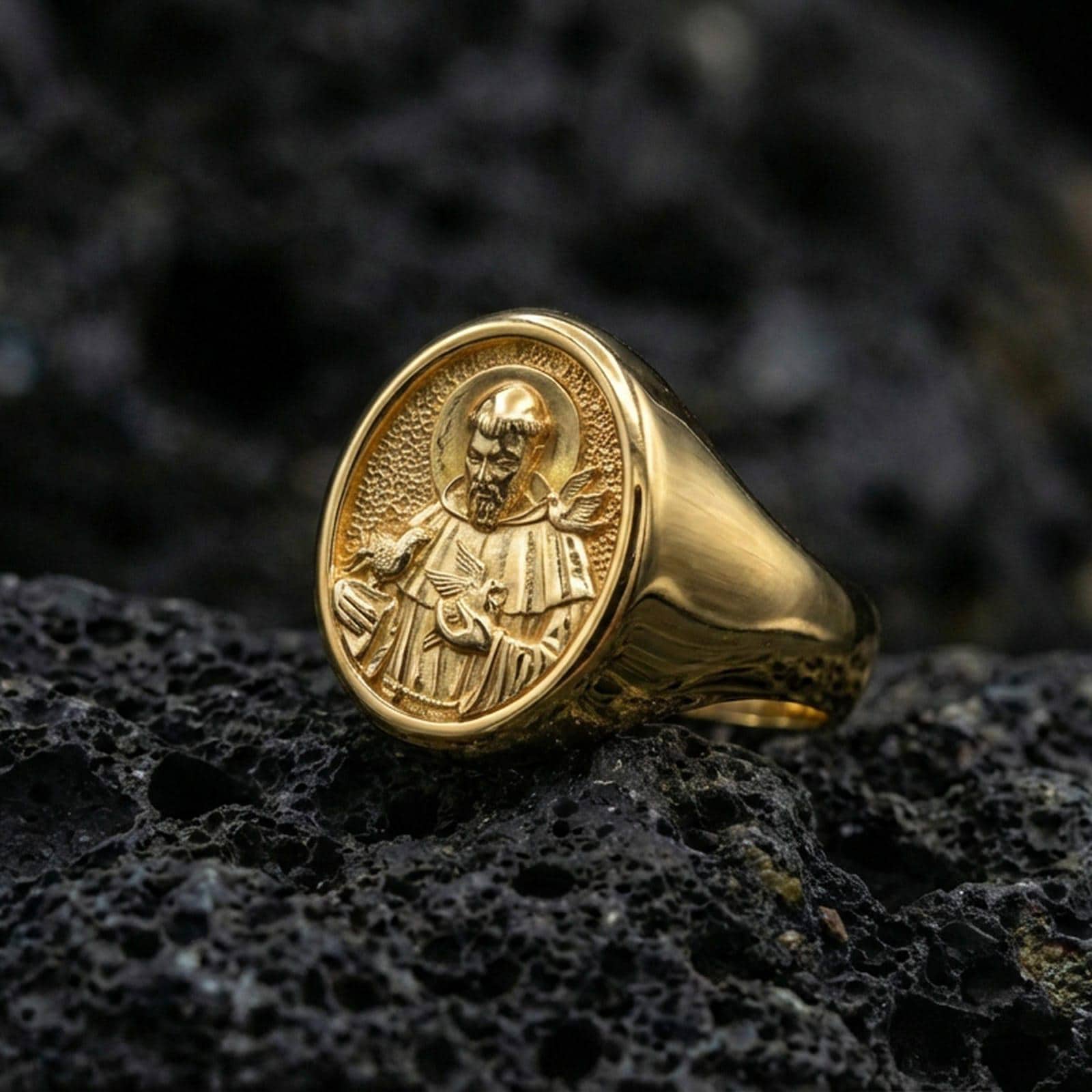 Gold plated St Francis ring on volcanic stone, Catholic saint signet ring with halo relief