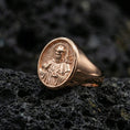 Load image into Gallery viewer, Rose gold plated St Francis signet ring on volcanic rock, religious jewelry gift for him
