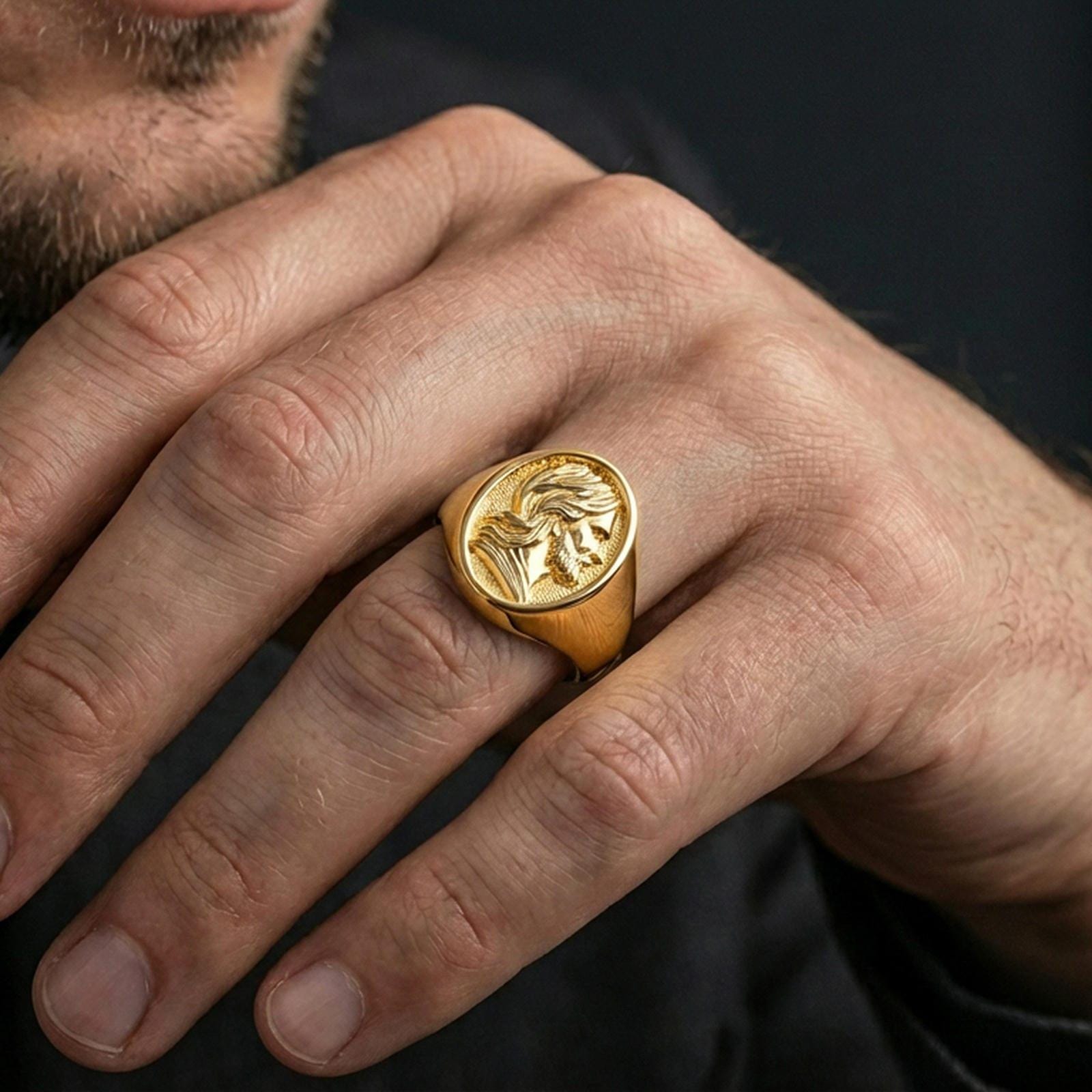 Gold plated Jesus signet ring worn on finger, meaningful religious gift ring for him