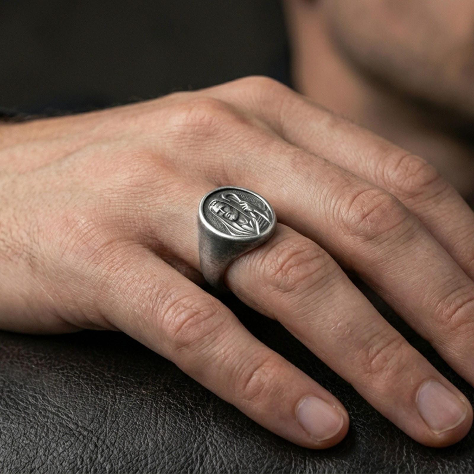 Oxidized 925 sterling silver Jesus Shepherd ring worn on finger, sacred portrait signet style, Christian jewelry