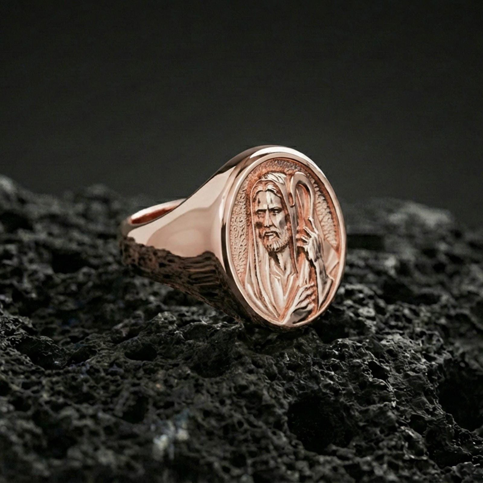 Rose gold plated Jesus Shepherd ring on volcanic stone, shepherd staff design, elegant Christian signet ring