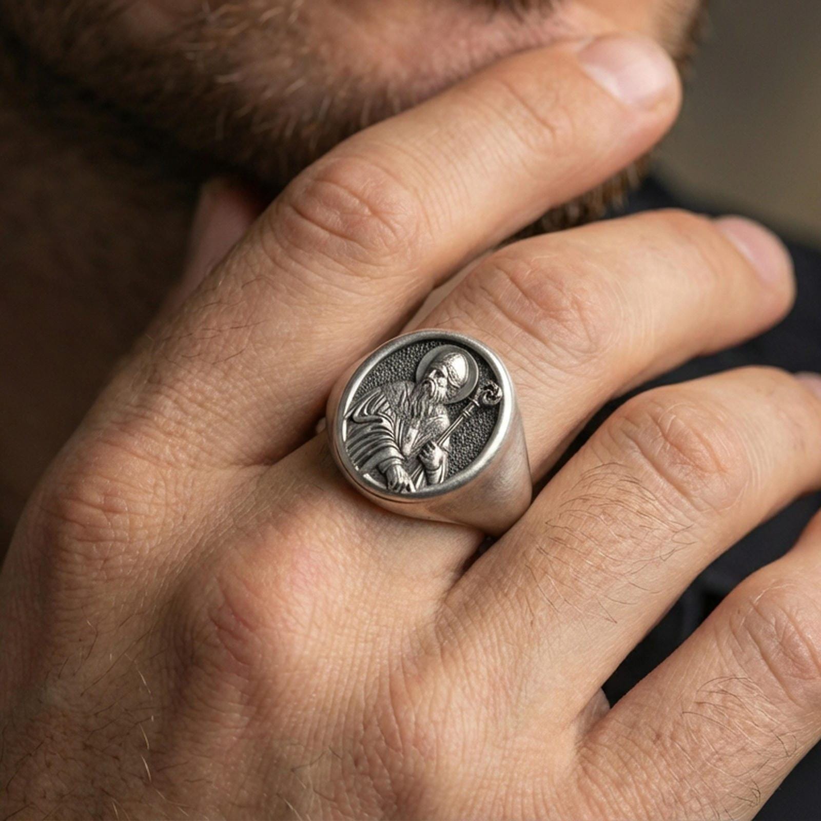 Oxidized 925 sterling silver Saint Benedict signet ring worn on finger, holy protector portrait relief, Catholic jewelry