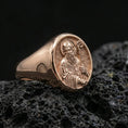 Load image into Gallery viewer, Rose gold plated Saint Benedict signet ring on volcanic stone, saint portrait signet design, faith jewelry
