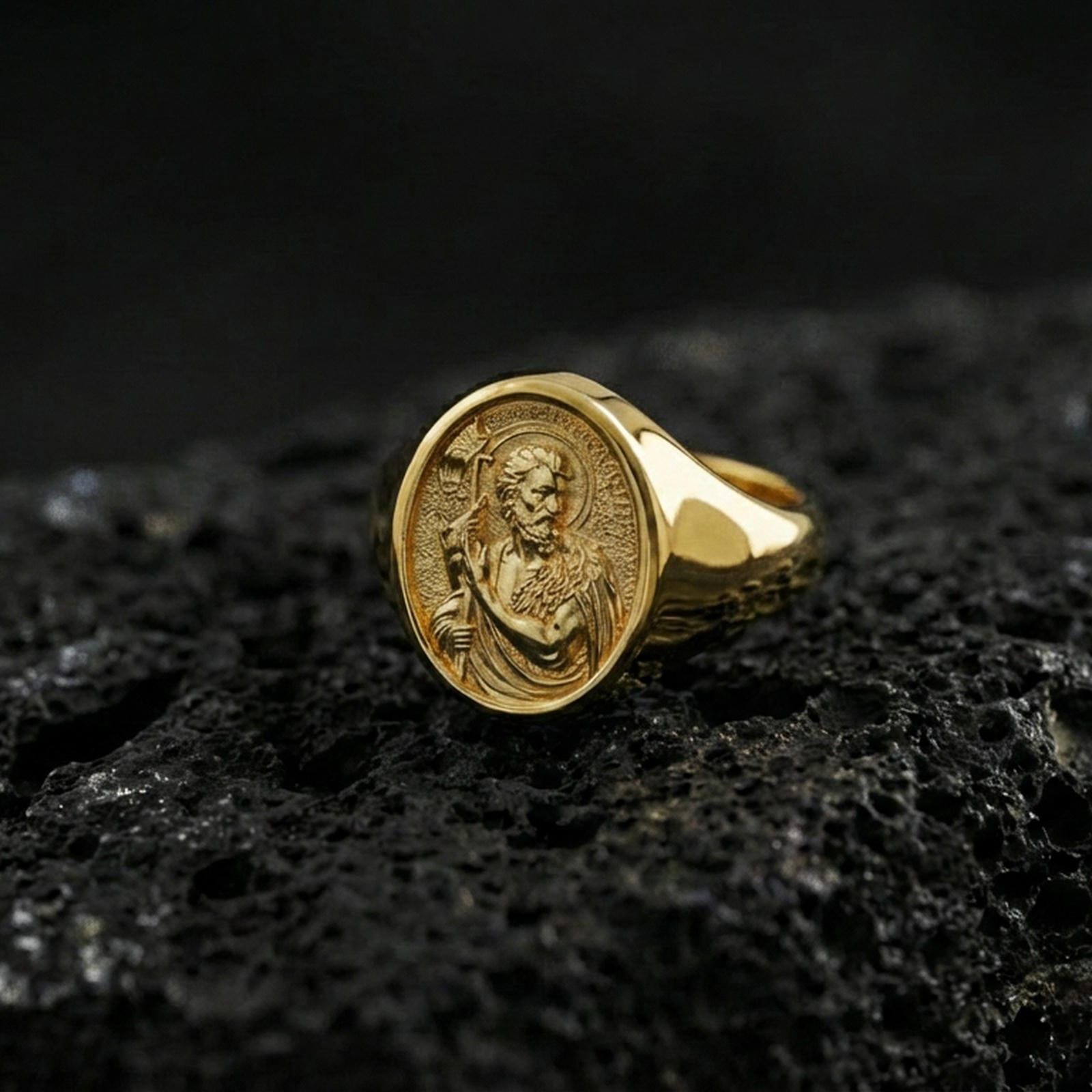 Gold plated Saint John the Baptist signet ring on dark volcanic rock, saint portrait relief, Christian jewelry