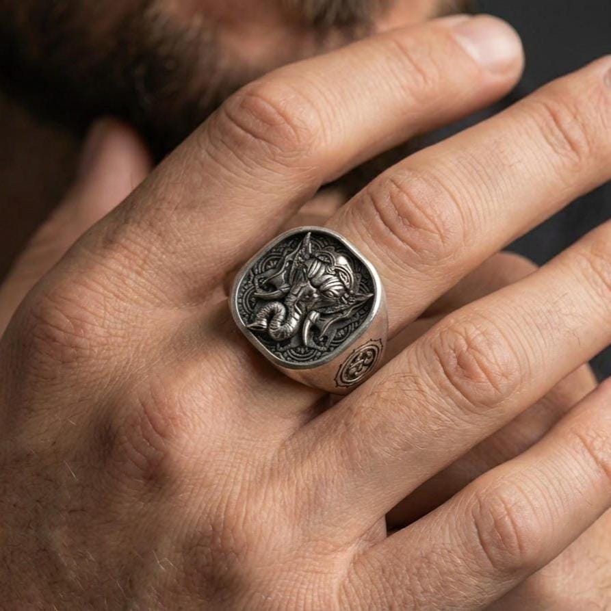 Oxidized 925 sterling silver Lord Ganesha signet ring worn on finger, elephant head relief, Hindu amulet jewelry