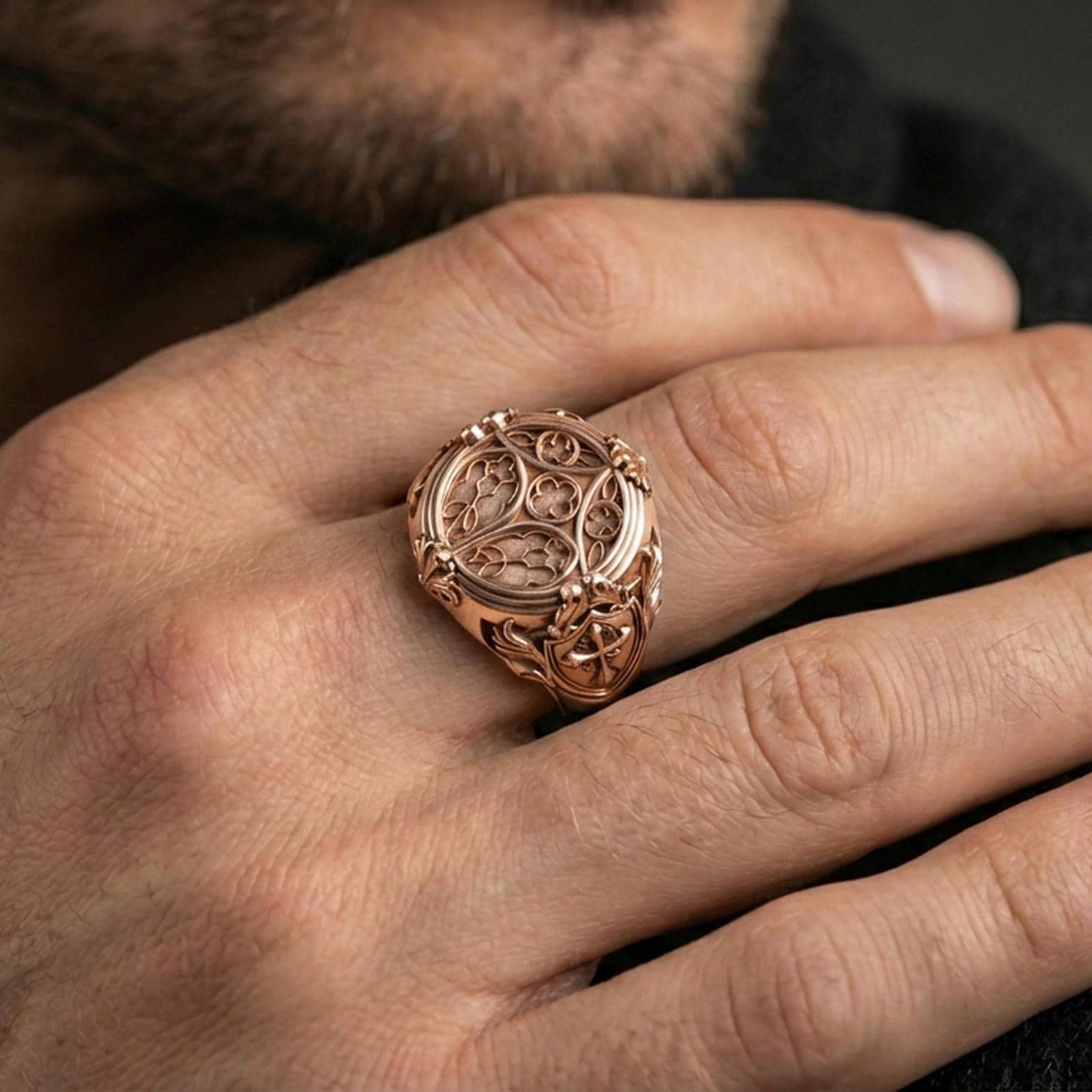 Rose gold plated cathedral window ring worn on finger, vintage gothic architecture design, statement ring