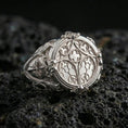 Load image into Gallery viewer, Polished silver cathedral window ring on porous volcanic stone, ornate medieval filigree, statement signet style
