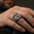 Load image into Gallery viewer, Oxidized 925 sterling silver St George dragon slayer ring worn on finger, ornate signet with Celtic cross side panel
