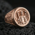 Load image into Gallery viewer, Rose gold plated St Michael signet ring on volcanic stone, archangel wings and sword design, religious statement ring
