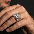 Load image into Gallery viewer, Polished silver crusader cross ring worn on finger, engraved Christian signet style, premium religious accessory

