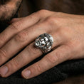 Load image into Gallery viewer, Polished silver Jesus crown of thorns ring worn on finger, detailed Christ portrait, bold religious ring
