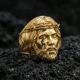 Load image into Gallery viewer, Gold plated sterling silver Jesus head ring on dark volcanic rock, crown of thorns portrait, religious statement jewelry
