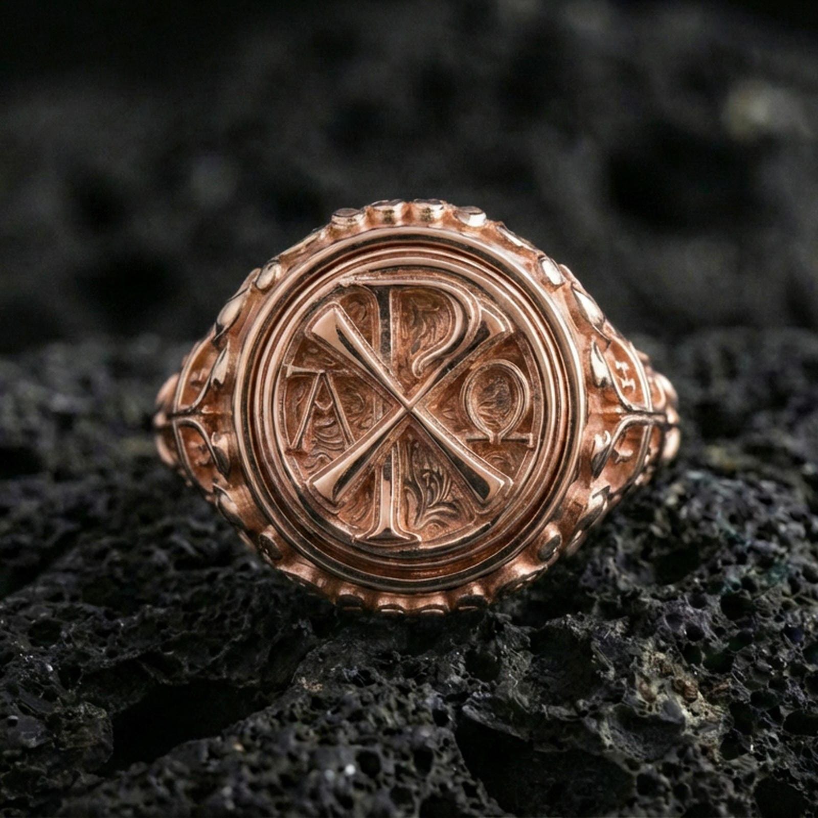 Rose gold plated Chi Rho Alpha Omega ring on volcanic stone, round faith emblem, religious signet statement ring