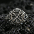 Load image into Gallery viewer, Oxidized 925 sterling silver Chi Rho ring on volcanic rock, Alpha Omega Christian symbol, detailed round signet
